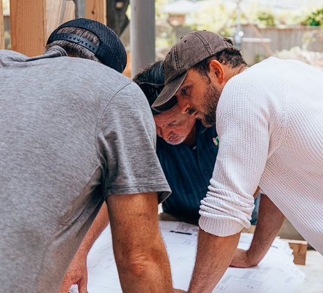 Three men standing near each other